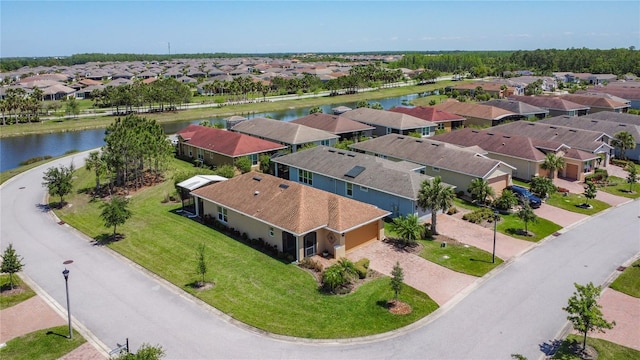 328 Vestrella Dr, Poinciana, FL 34759 - birds eye view of property with a residential view and a water view
