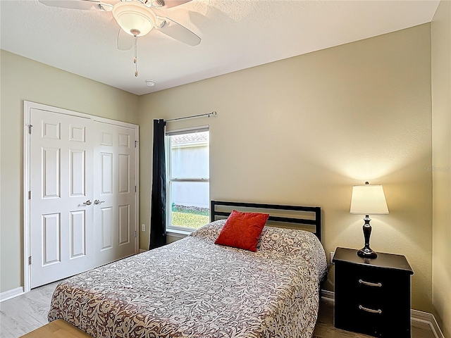 328 Vestrella Dr, Poinciana, FL 34759 - bedroom featuring a closet, ceiling fan, baseboards, and wood finished floors