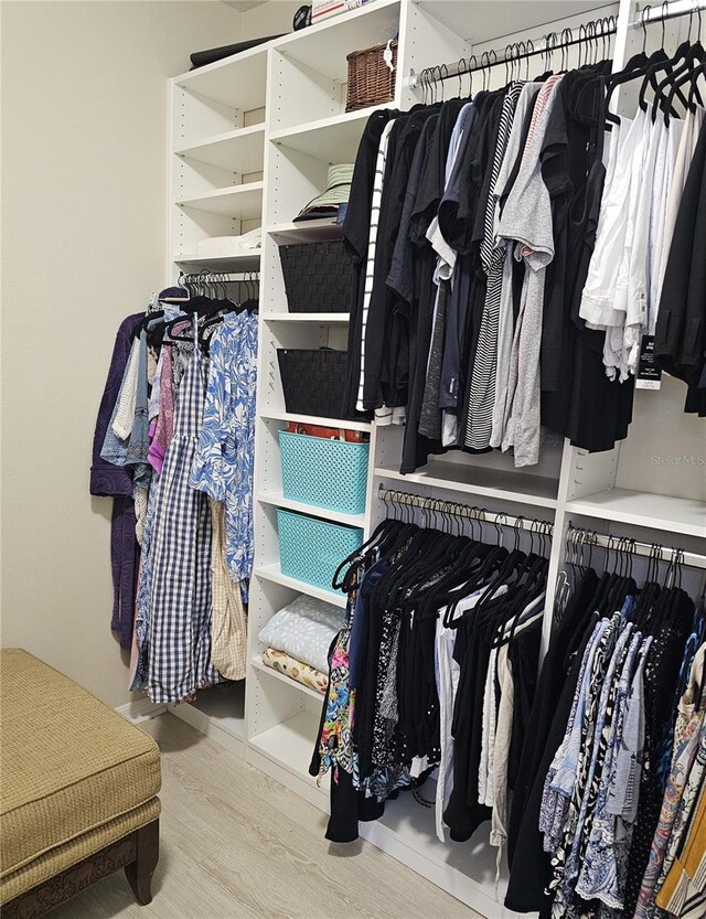 328 Vestrella Dr, Poinciana, FL 34759 - spacious closet with wood finished floors