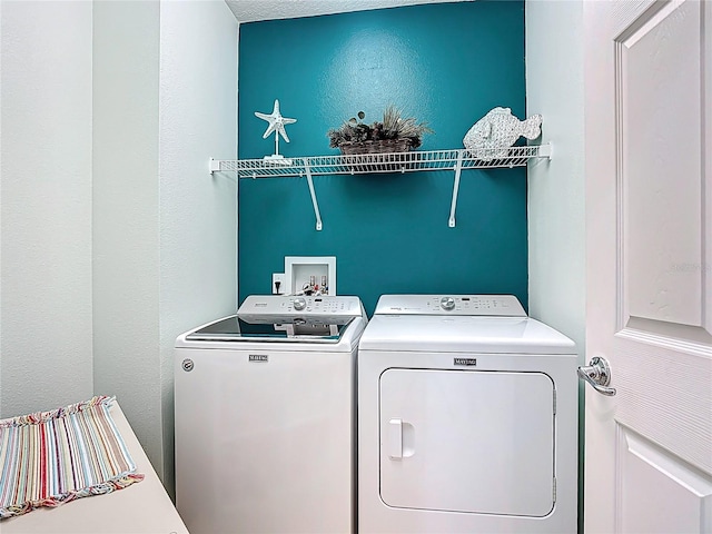 328 Vestrella Dr, Poinciana, FL 34759 - laundry room with laundry area and washer and clothes dryer