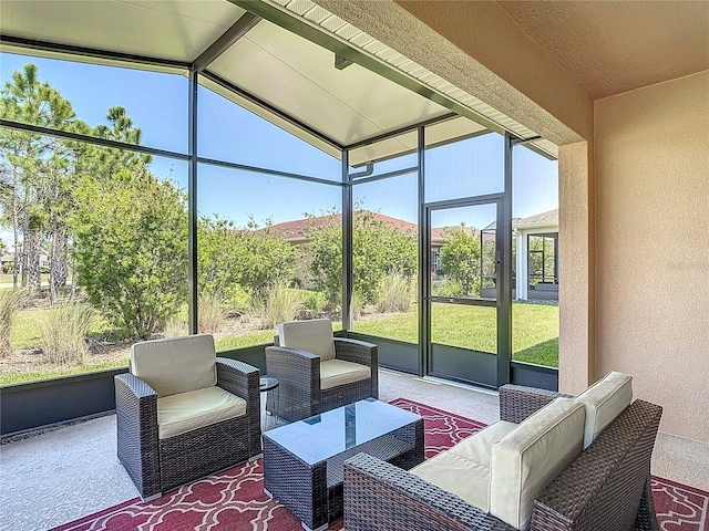 328 Vestrella Dr, Poinciana, FL 34759 - sunroom with beamed ceiling and an outdoor hangout area