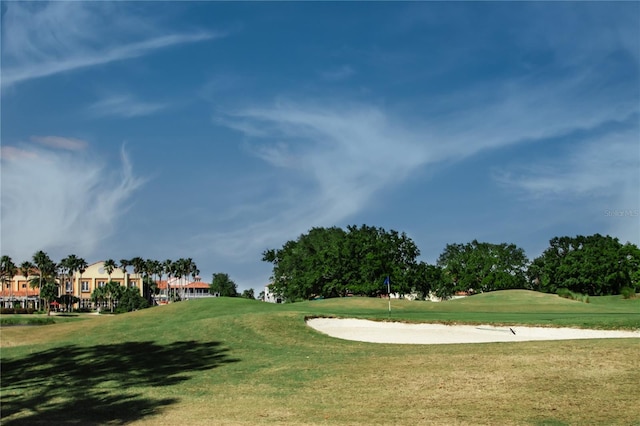 328 Vestrella Dr, Poinciana, FL 34759 - view of home's community with golf course view and a lawn