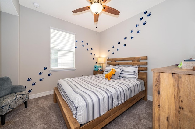 bedroom featuring ceiling fan, baseboards, and carpet