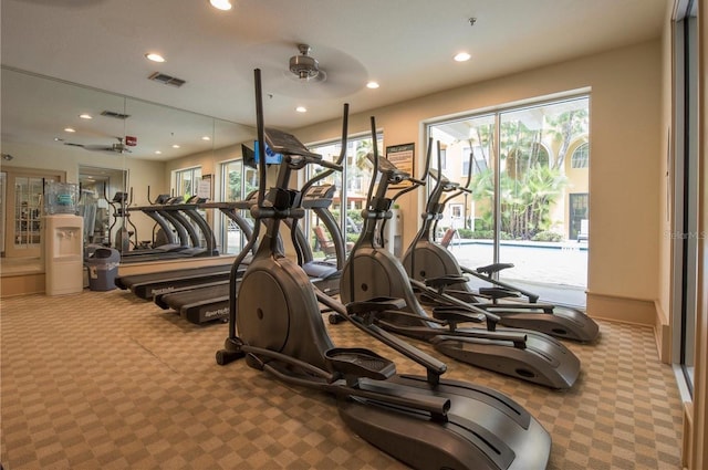 gym with visible vents, ceiling fan, recessed lighting, and carpet flooring
