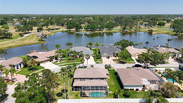 birds eye view of property featuring a water view and a residential view