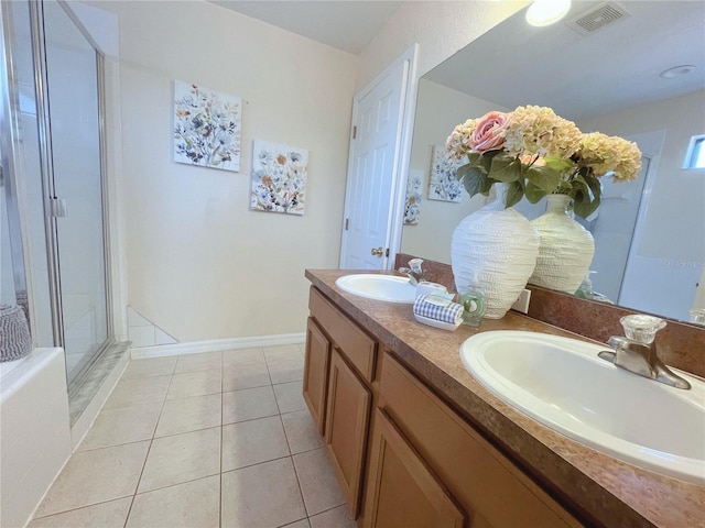 141 Summer Place Loop, Clermont, FL 34714 - full bathroom featuring double vanity, a shower stall, and tile patterned floors