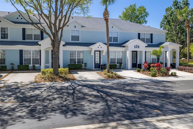 townhome / multi-family property with stucco siding