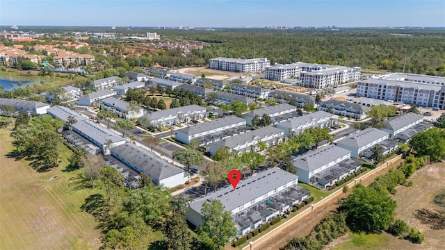 drone / aerial view with a view of trees