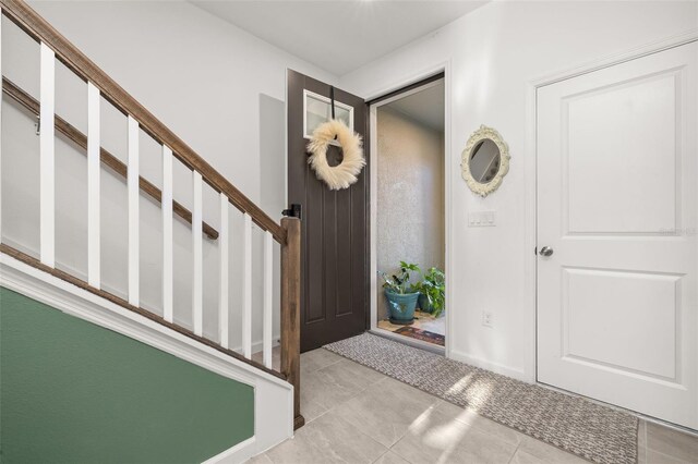 1177 Seaside Mist Trl, Kissimmee, FL 34747 - entryway featuring tile patterned floors