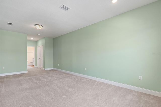 7505 Laureate Blvd Unit 2208, Orlando, FL 32827 - spare room featuring light colored carpet, visible vents, recessed lighting, and baseboards
