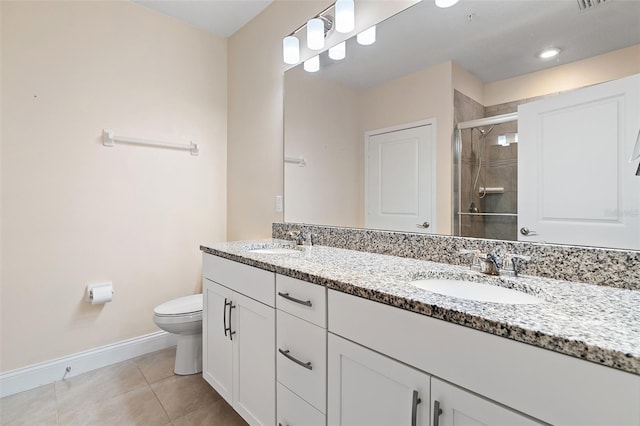 7505 Laureate Blvd Unit 2208, Orlando, FL 32827 - full bath with toilet, a sink, a shower stall, and baseboards