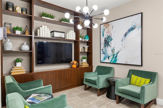 7505 Laureate Blvd Unit 2208, Orlando, FL 32827 - sitting room with light tile patterned flooring and a chandelier
