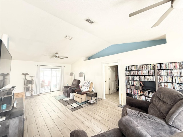 6922 Doehring Dr, Lakeland, FL 33810 - living room with visible vents, lofted ceiling, wood finished floors, baseboards, and a ceiling fan