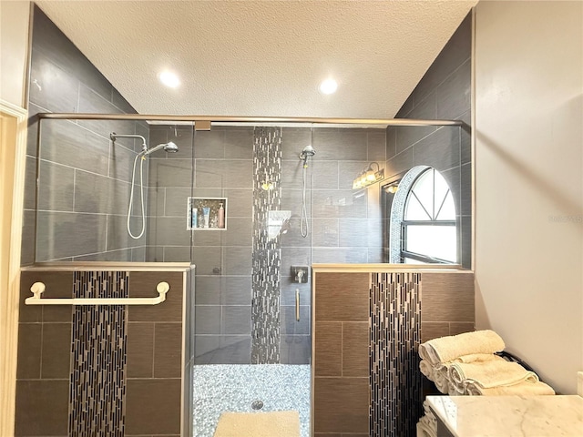 6922 Doehring Dr, Lakeland, FL 33810 - bathroom featuring a stall shower and a textured ceiling