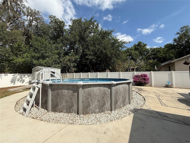 6922 Doehring Dr, Lakeland, FL 33810 - view of swimming pool with a fenced backyard and a fenced in pool