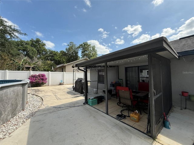 6922 Doehring Dr, Lakeland, FL 33810 - view of patio / terrace with a fenced in pool and fence
