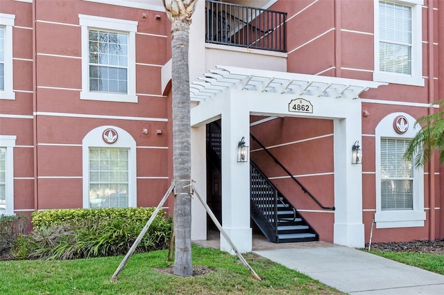 4862 Cayview Ave Unit 407, Orlando, FL 32819 - entrance to property with stucco siding