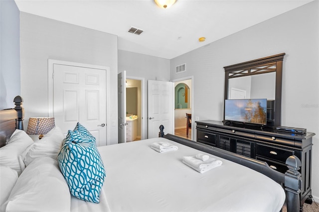 4862 Cayview Ave Unit 407, Orlando, FL 32819 - bedroom featuring arched walkways and visible vents