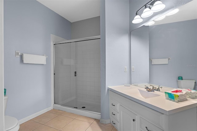 4862 Cayview Ave Unit 407, Orlando, FL 32819 - bathroom featuring tile patterned floors, toilet, a stall shower, and baseboards