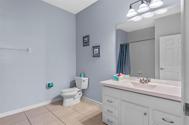 4862 Cayview Ave Unit 407, Orlando, FL 32819 - full bath with toilet, tile patterned floors, a shower with shower curtain, and baseboards