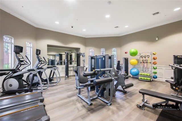 4862 Cayview Ave Unit 407, Orlando, FL 32819 - workout area with light wood-style flooring, visible vents, and recessed lighting