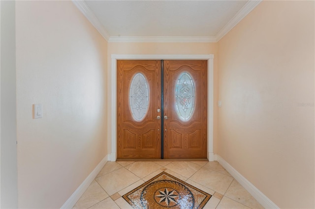 foyer with light tile patterned flooring, baseboards, and ornamental molding