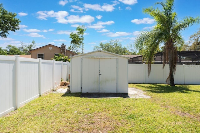 view of shed featuring a fenced backyard