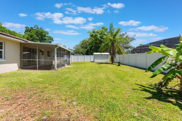 580 S Indigo Rd, Altamonte Springs, FL 32714 - fenced backyard with a sunroom
