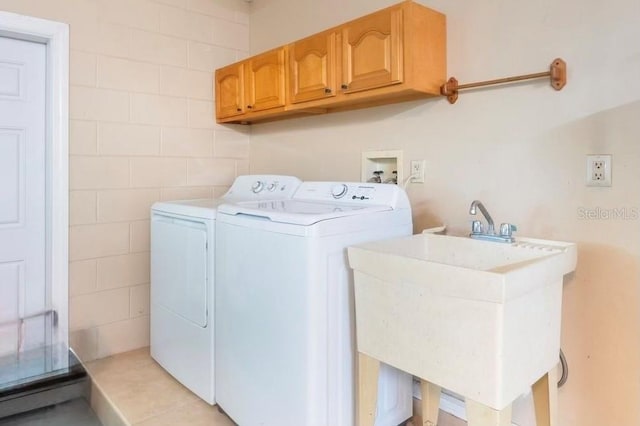 580 S Indigo Rd, Altamonte Springs, FL 32714 - washroom with cabinet space and washing machine and dryer