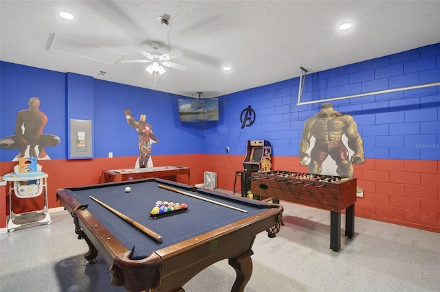2237 Wyndham Palms Way, Kissimmee, FL 34747 - game room with recessed lighting, a textured ceiling, a ceiling fan, and concrete block wall