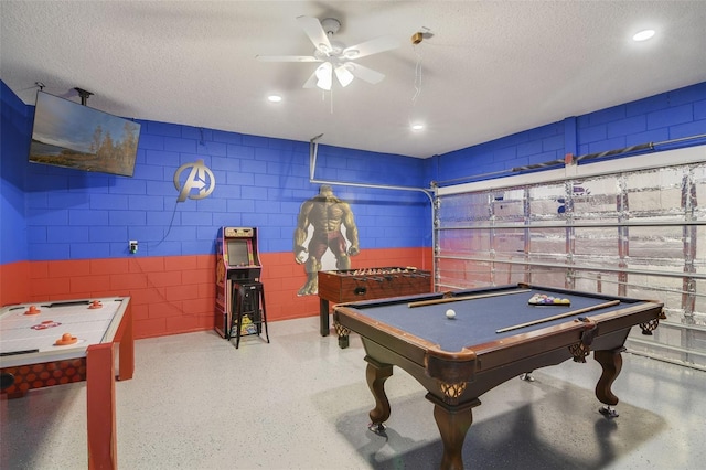 2237 Wyndham Palms Way, Kissimmee, FL 34747 - recreation room featuring billiards, a ceiling fan, concrete block wall, and a textured ceiling