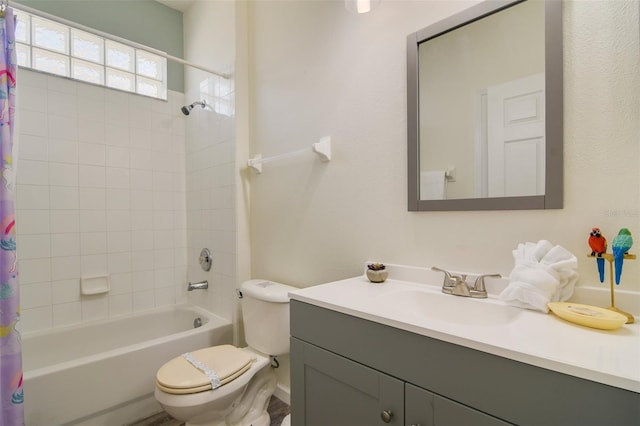 2237 Wyndham Palms Way, Kissimmee, FL 34747 - bathroom featuring toilet, shower / tub combo, and vanity