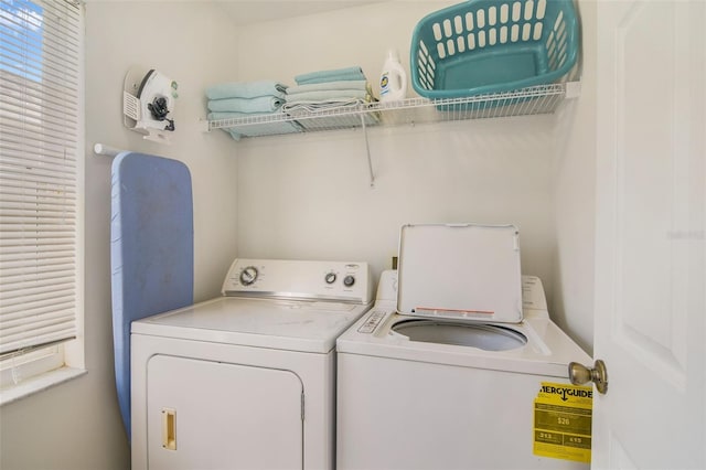 2237 Wyndham Palms Way, Kissimmee, FL 34747 - washroom featuring laundry area and washing machine and clothes dryer