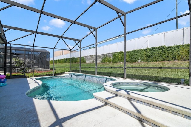 2237 Wyndham Palms Way, Kissimmee, FL 34747 - view of pool with a patio area, a pool with connected hot tub, glass enclosure, and a lawn