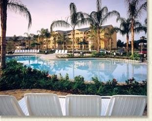 2237 Wyndham Palms Way, Kissimmee, FL 34747 - view of pool at dusk