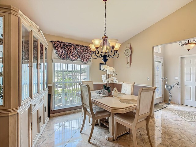 106 Meridian St, Davenport, FL 33837 - dining room featuring marble finish floor and a notable chandelier