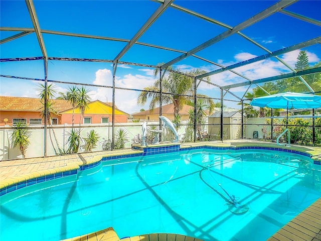 106 Meridian St, Davenport, FL 33837 - view of pool featuring a storage shed, a fenced backyard, an outbuilding, a fenced in pool, and a lanai