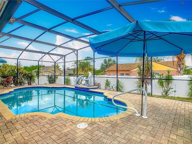 106 Meridian St, Davenport, FL 33837 - view of swimming pool featuring a patio area, a fenced backyard, a fenced in pool, and glass enclosure