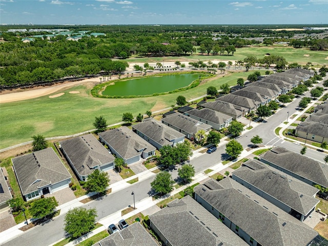 7957 Hanson Bay Pl, Kissimmee, FL 34747 - drone / aerial view featuring golf course view, a residential view, and a water view