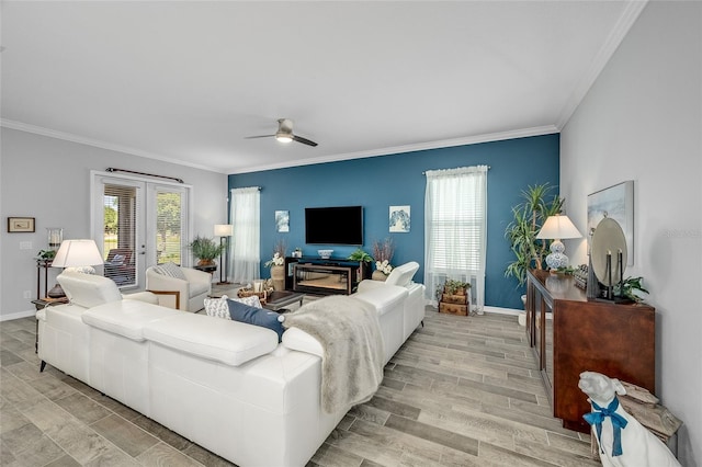 7957 Hanson Bay Pl, Kissimmee, FL 34747 - living room featuring wood tiled floor, ceiling fan, and ornamental molding