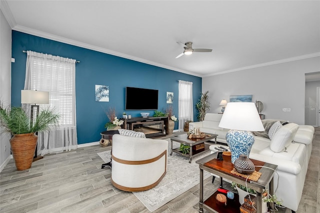 7957 Hanson Bay Pl, Kissimmee, FL 34747 - living area with ornamental molding, a ceiling fan, wood finished floors, and baseboards