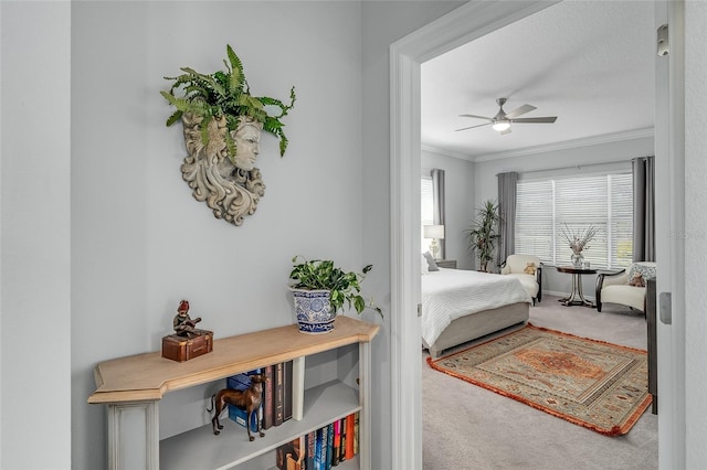 7957 Hanson Bay Pl, Kissimmee, FL 34747 - carpeted bedroom with ceiling fan and crown molding