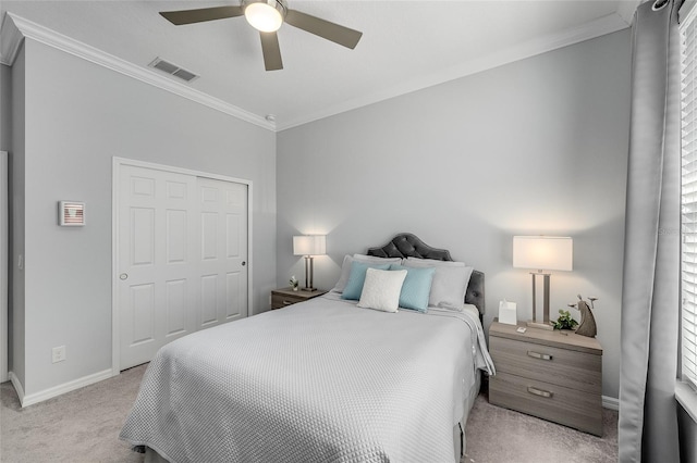 7957 Hanson Bay Pl, Kissimmee, FL 34747 - bedroom featuring light colored carpet, a closet, ornamental molding, baseboards, and visible vents