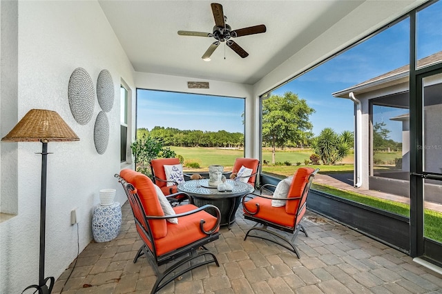 7957 Hanson Bay Pl, Kissimmee, FL 34747 - sunroom featuring ceiling fan