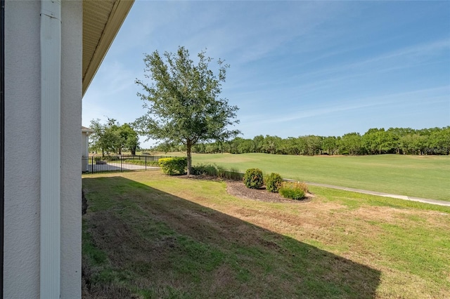 7957 Hanson Bay Pl, Kissimmee, FL 34747 - view of yard with fence and view of golf course