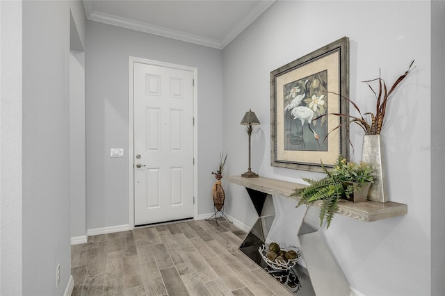 7957 Hanson Bay Pl, Kissimmee, FL 34747 - entrance foyer featuring crown molding, baseboards, and light wood-type flooring