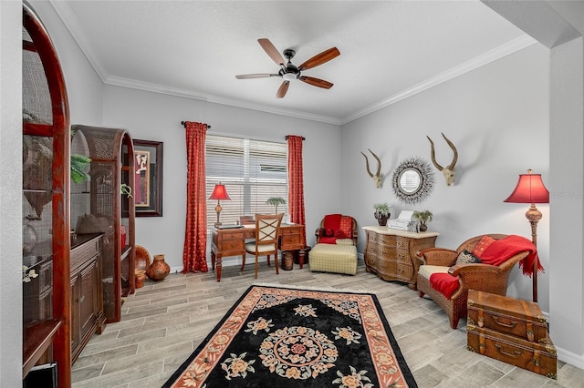 7957 Hanson Bay Pl, Kissimmee, FL 34747 - sitting room with ornamental molding, ceiling fan, baseboards, and light wood-type flooring
