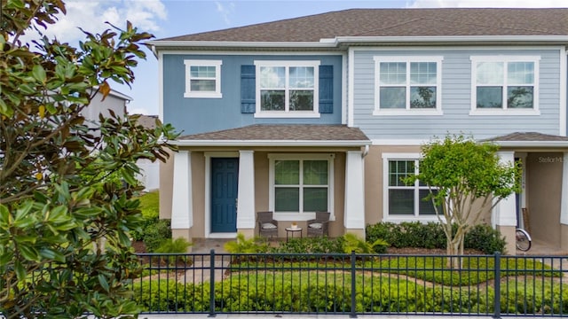 11162 Hanlon Terrace Aly, Winter Garden, FL 34787 - traditional-style home featuring stucco siding and a fenced front yard