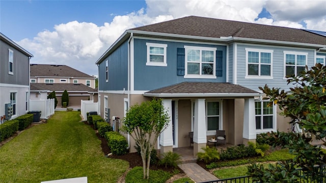 11162 Hanlon Terrace Aly, Winter Garden, FL 34787 - view of front of house featuring a front yard, a porch, and fence