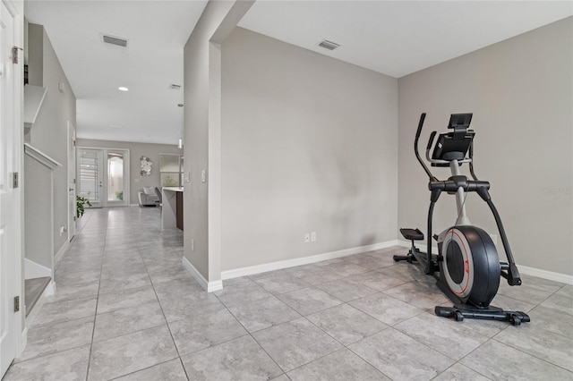 11162 Hanlon Terrace Aly, Winter Garden, FL 34787 - workout room with light tile patterned floors, baseboards, visible vents, and recessed lighting